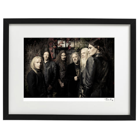 Framed photo print of symphonic metal band Nightwish from the Human Nature album promo shoot. The band are dressed in black, surrounded by autumnal leaves. Signed print by Tina K Photography.