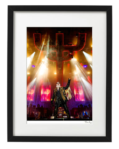 Framed Photo print of Rob Halfold of Judas Priest onstage at Bloodstock in 2021. Features Rob Halford on stage standing in front of the Judas Priest cross symbol rig. By Tina K Photography.