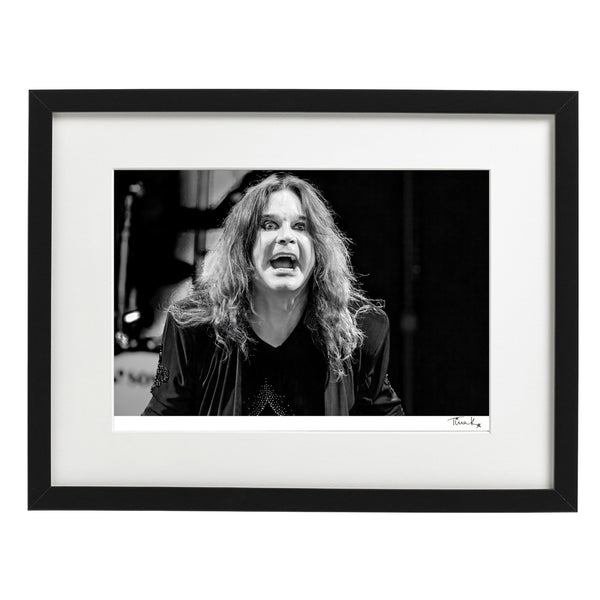 FRAMED black and white print of Ozzy Osbourne of Black Sabbath performing at the Download Festival in 2012.  Features a close-up of Ozzy on stage taken by Tina K Photography.