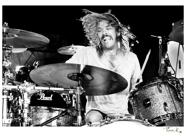 Taylor Hawkins playing drums onstage at Download festival 2010 with Taylor Hawkins And The Coattail Riders. Black and white print by Tina K Photography