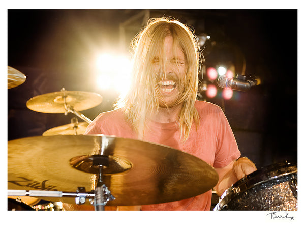 Taylor Hawkins playing drums onstage at Download festival 2010 with Taylor Hawkins And The Coattail Riders.Print by Tina K Photography