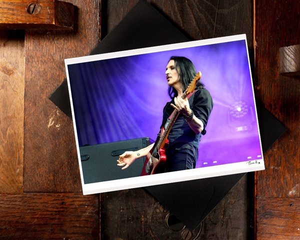 Hand printed greeting card of Brian Molko of Placebo playing red guitar on stage at the MK Stadium in 2022. Photo print signed by Tina K Photography.