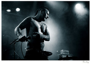 Jeff JJ Janiak of Discharge on stage at the Electric Ballroom London, 2019. Black & white print, signed by Tina K Photography.