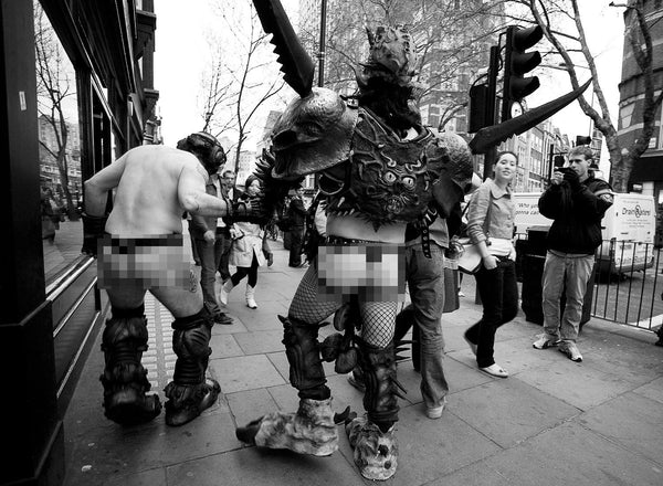Oderus Urungus from GWAR making his way back to Astoria from Crobar in London in 2007 with onlookers staring. Black and white print by Tina K Photography.