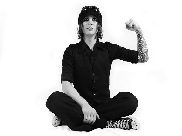 Poster print of singer Ville Valo from HIM shot against a while canvas at London Astoria in 2003