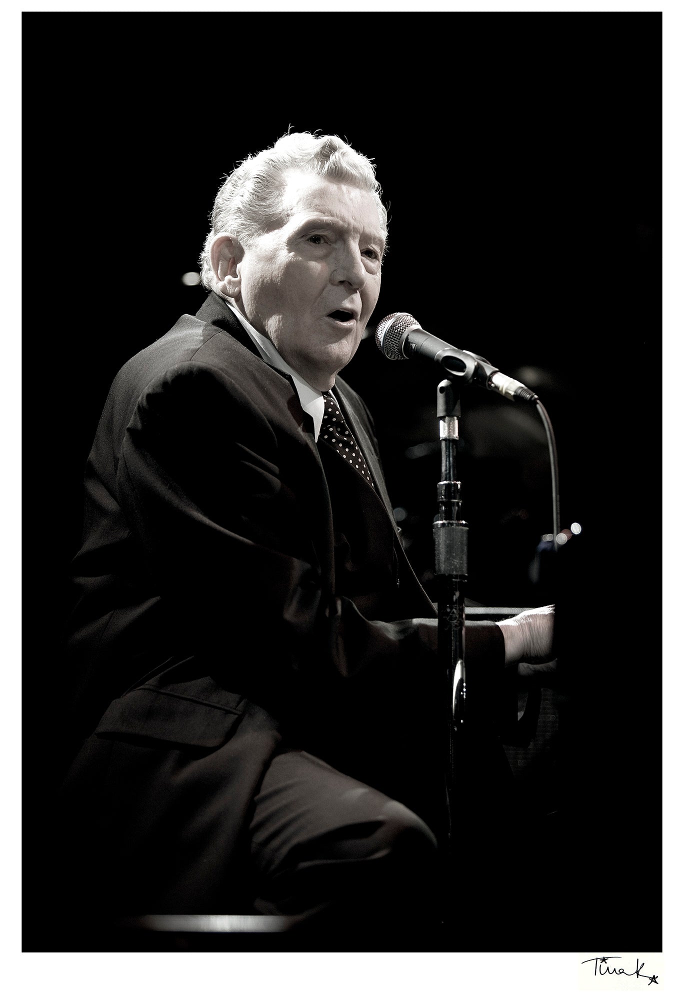 Unframed music wall art print of pioneering Rock and Roll singer and pianist Jerry Lee Lewis, The Killer, sitting at piano onstage in 2008
