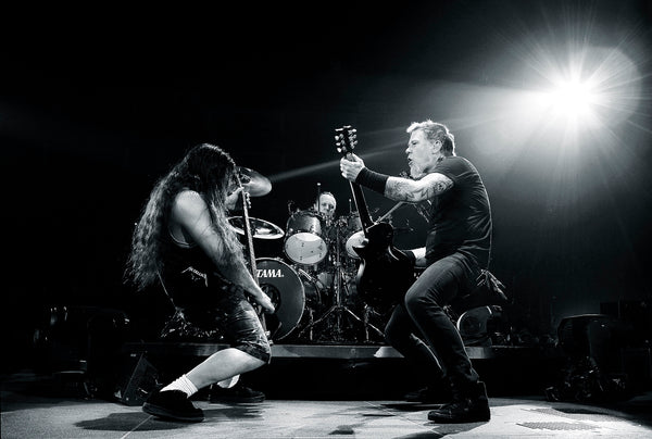 Black and white print of Robert, Lars and James of Metallica performing on stage 2009