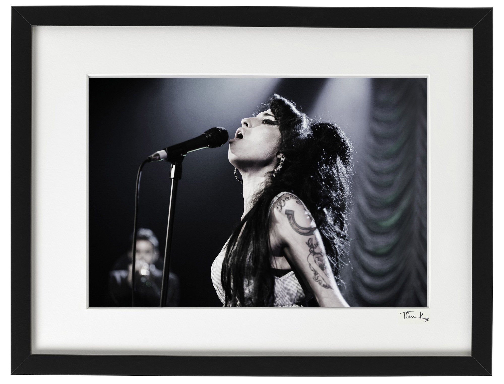 Framed print of Amy Winehouse on stage during her Back to Black Tour, photo by rock photographer Tina K