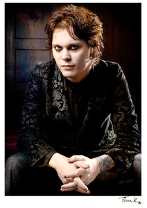 Poster print of Ville Valo from Finnish rock band HIM sitting wearing a black jacket 2005