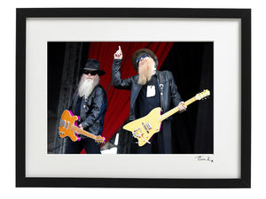 Dusty Hill and Billy Gibbons of ZZ Top with guitars, on stage at Download Festival 2009. Original framed print , signed by Tina K Photography.