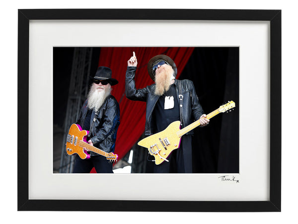 Dusty Hill and Billy Gibbons of ZZ Top with guitars, on stage at Download Festival 2009. Original framed print , signed by Tina K Photography.